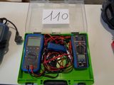 a box with a bunch of electrical equipment on a table