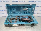 a blue tool box with a drill and a cord in it