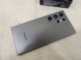 a picture of a phone with a camera attached to it