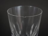 a clear glass that is sitting on a table