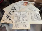 a lot of comics on the table together