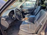 the interior of a car with the front seats down and the passenger seat down