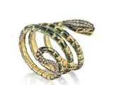 une bague en forme de serpent en or et diamants, signée Van Cleef