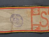 an old flag with a red and yellow stripe on it