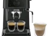 delong coffee machine with two cups of coffee next to it