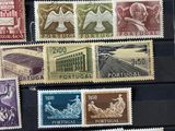 several different types of stamps are displayed on a black surface