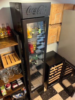 a refrigerator that has a lot of bottles in it
