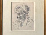 portrait of a man with a beard in a gold frame