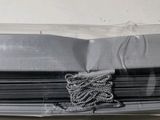 a picture of a stack of papers wrapped in a plastic bag