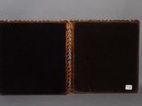 pair of antique wooden picture frames with black velvet covers