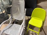 two chairs sitting next to each other in a room