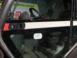a close up of a car door with a sticker on it