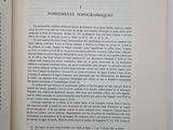 an open book with a picture of a bird on it