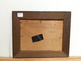 a picture of a piece of wood with a piece of black tape on it