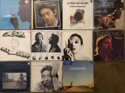 a lot of music cds on the floor together