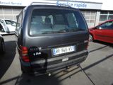 a black van that is parked in a parking lot