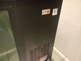 an image of a refrigerator in a kitchen with a sticker on the door