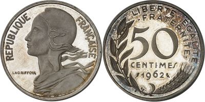 a close up of a coin with a woman ' s face on it