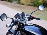 a motorcycle that is parked on the side of the road