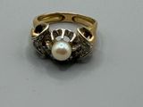 une image représentant une bague sertie d'une perle