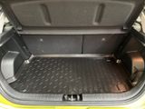 a trunk of a small car with the door open