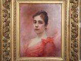 portrait of a woman in a red dress in a gold frame