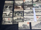many old postcards of different types on the table