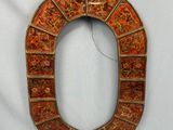 a picture of a decorative object on a white surface