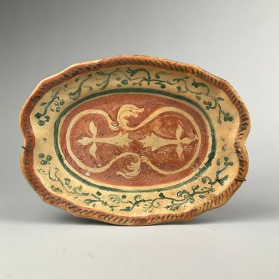 an image of a decorative bowl with a dragon on it