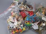 a lot of toys in the bags on the table