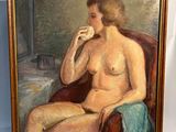 une peinture à l'huile représentant une femme nue assise sur une chaise rouge