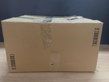 a box that is sitting on a wooden table