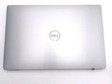 dell laptop computer with dell logo on the screen on a white surface