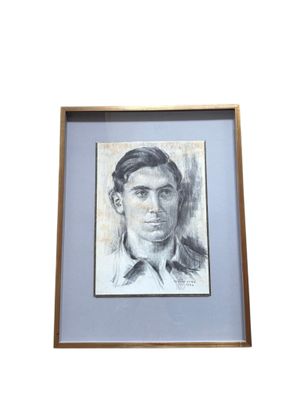 portrait d'un homme en costume-cravate dans un cadre en bois