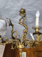 Lustre à 8 lumières en laiton doré à décor de feuillages et … (photo 2)