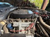 a picture of a car engine in the back of a truck