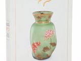 an image of a book with a picture of a vase on it