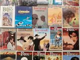 a lot of books that are on the wall