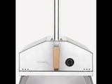 an image of a stainless steel pizza oven with a wooden handle
