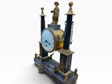 a blue and gold clock with statues on it