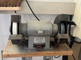 a machine that is sitting on a table in a garage
