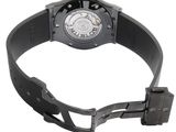 an image of a wrist watch with a black rubber band