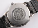an image of a close up of a watch on a white surface