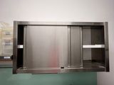 a stainless steel sink in the middle of a kitchen