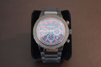 a watch that is sitting on top of a table