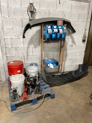 a picture of a car being worked on in a garage