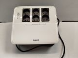 a white toaster that has three different sockets on it