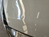 a close up of the hood of a car