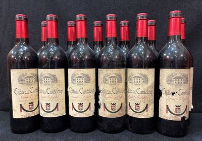 six bouteilles de vin rouge sont alignées