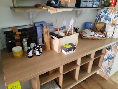 a wooden table with a lot of items on it